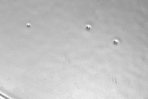Why Craters and Pinholes Appear on Powder Coated Surfaces and How to Prevent Them blog.webp